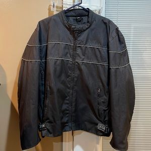 Men’s riding jacket w/zip out liner, reflective strips, many pockets & vented